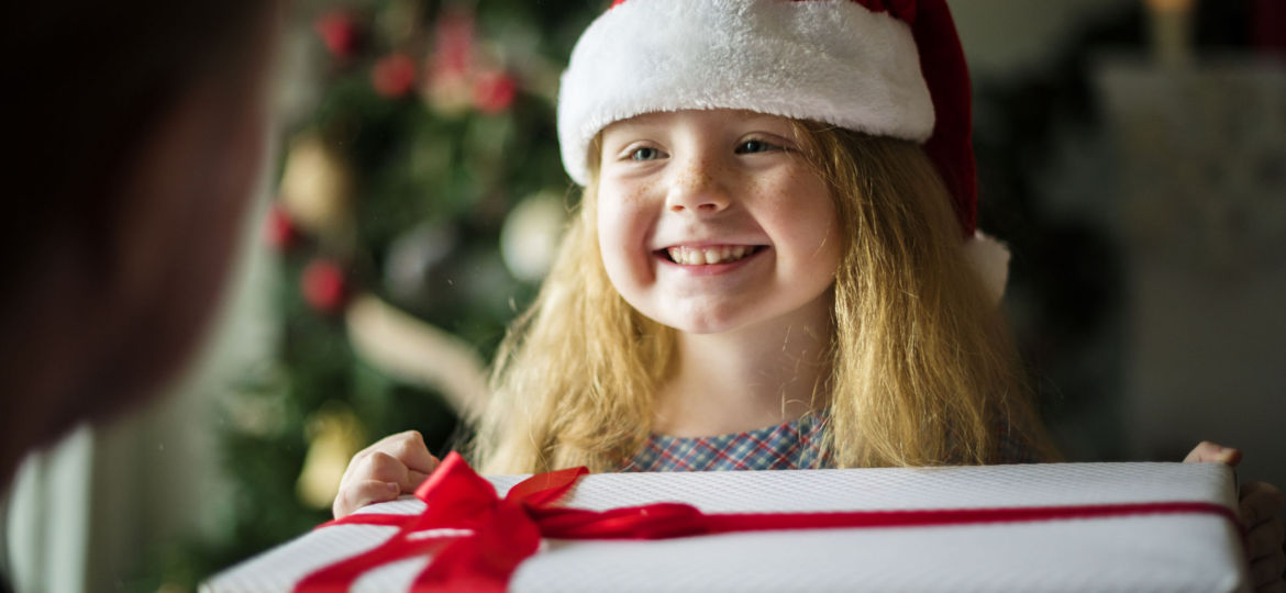 Young Caucasian girl enjoying Christmas holiday